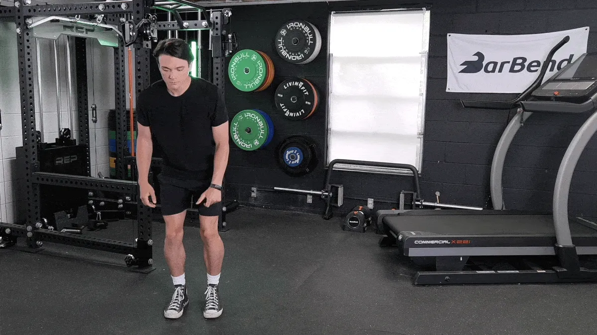 Jake demonstrating the skaters movement as one of the best cardiovascular exercises.