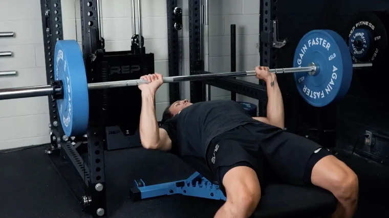 benching with the again faster pursuit olympic bar