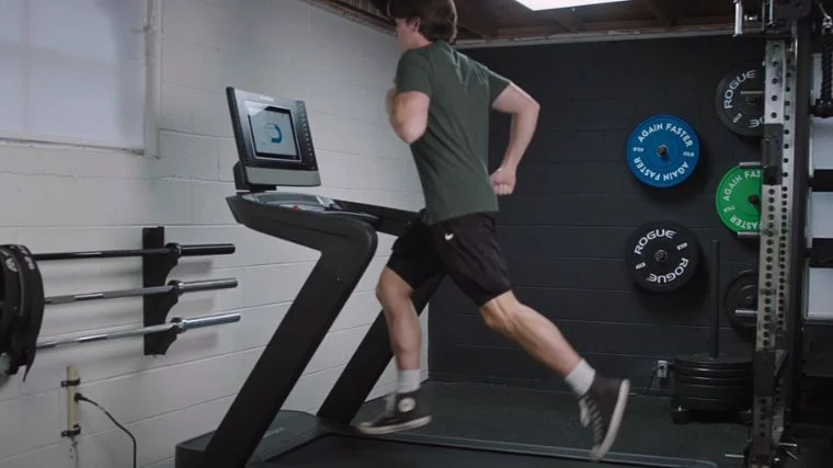 A person running on a treadmill.