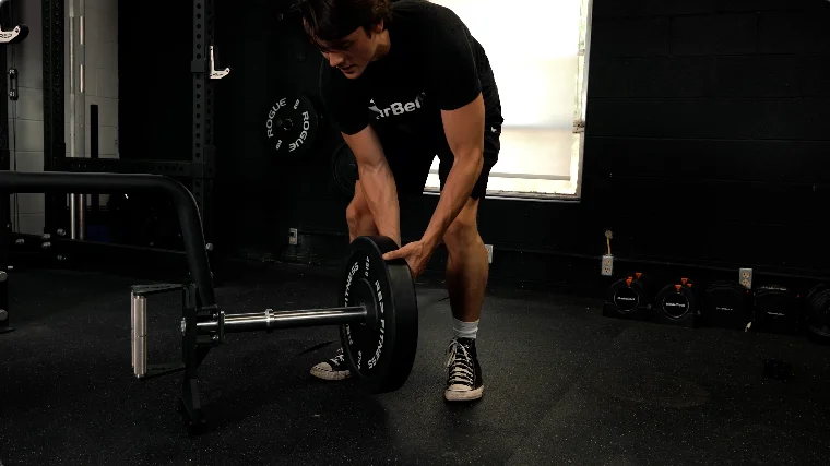Jake Loading Plates onto the REP Fitness Open Trap Bar