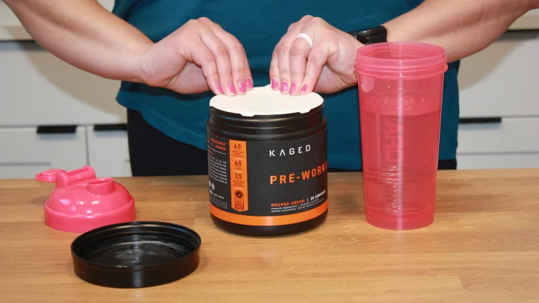 Our tester cracks open a fresh tub of Kaged Muscle Pre-Workout