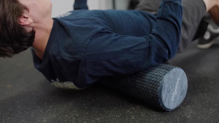 Jake Using the Living.Fit Foam Roller On His Back