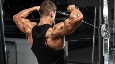 Barbend Featured Image A bodybuilder doing a face pull on the cable machine