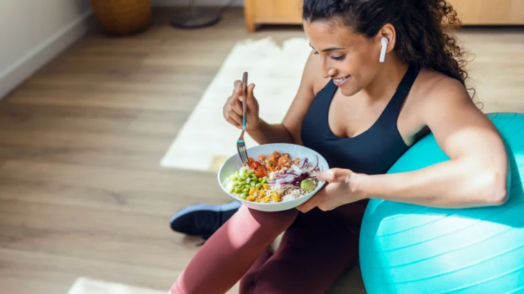 A person eating after a workout.