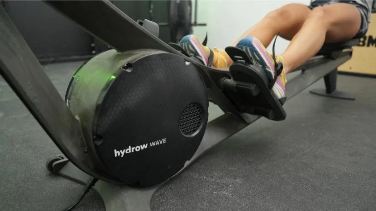 Our tester on the Hydrow Wave Rower.