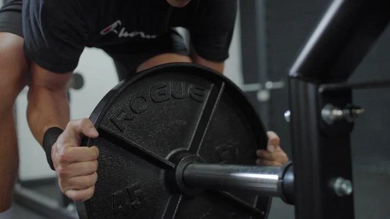 Jake Loading a 45-pound Rogue Deep Dish Plate onto a Trap Bar