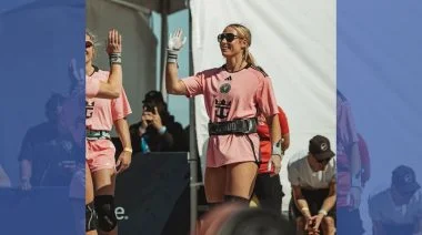 Sydney Wells giving a high-five after a competition.