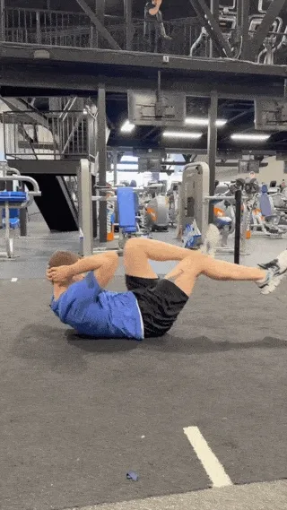 A person doing bicycle crunches.