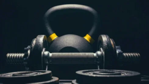 Dumbbells Vs. Kettlebells — Choose the Right Tool for Your Goals