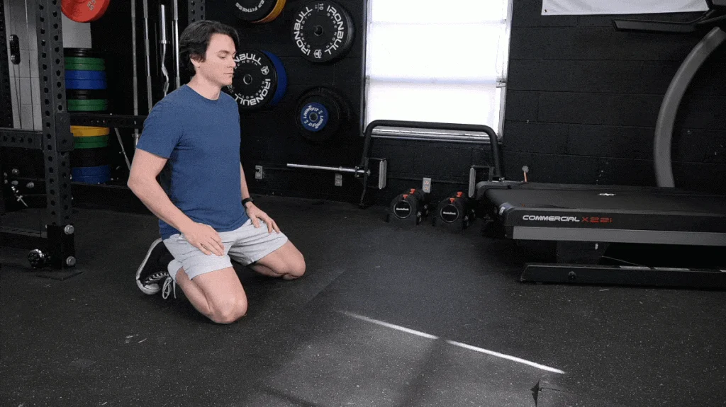 Jake is doing the child's pose stretch.