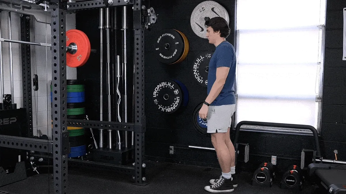 Jake doing the wall calf stretch.