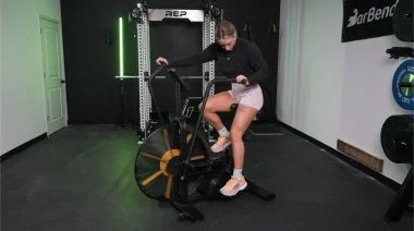 a person riding the Bells of Steel Blitz Air Bike 2.0