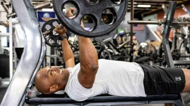 Antron Brown benchpressinging.