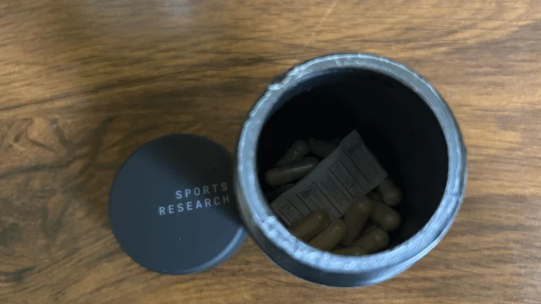 sports research probiotic open container close up