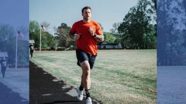 Travis Mayer is shown running to prep for the World Fitness Project Tour