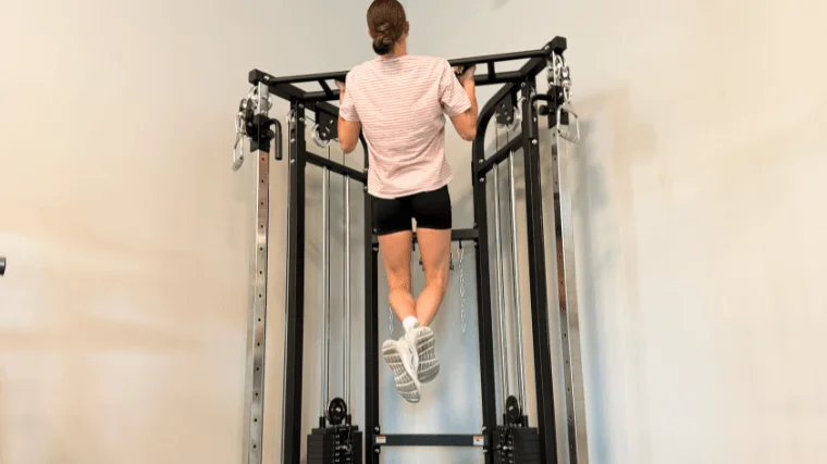 Our tester performing some pull-ups on the Bells of Steel Functional Trainer