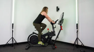 Our tester preps for the BowFlex VeloCore Bike Review.