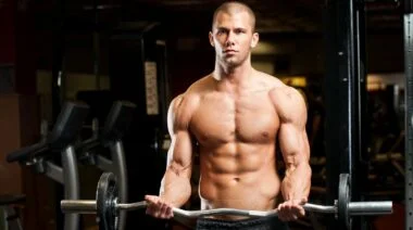 barbell wrist curl featured image barbend
