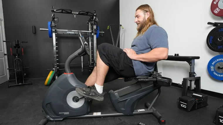 A BarBend Tester on the Schwinn 230 Recumbent Bike.