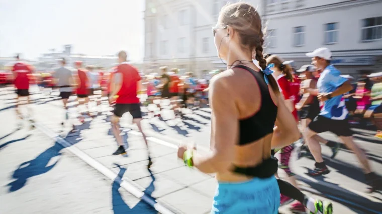 A fit person participating on a marathon.