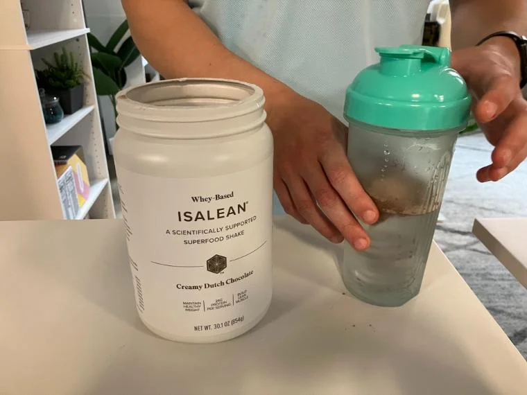 Our tester mixing a serving of Isagenix IsaLean Shake.