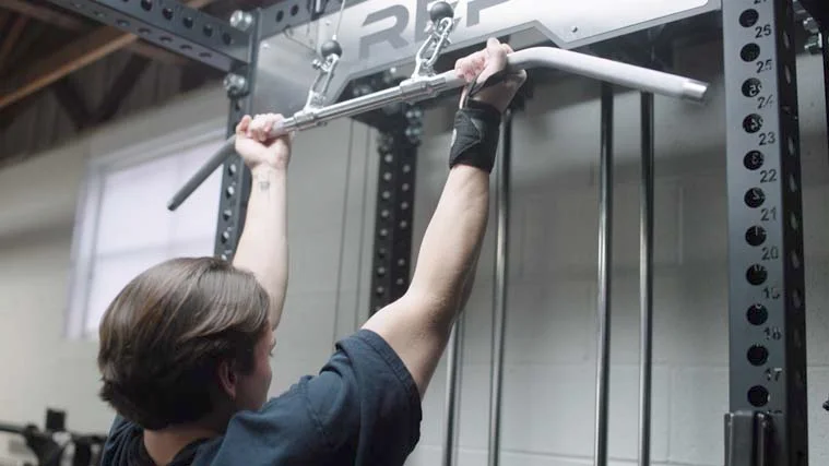 Jake Doing Reserve-Grip Lat Pulldowns with the PR-5000 Our tester doing the reserve-grip lat pulldowns with the PR-5000.