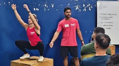 Two instructors at a CrossFit Level 1 seminar.