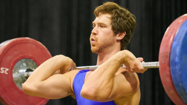 man front racking barbell 