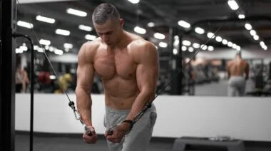 A person doing a cable flye.