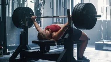 A person doing bench press exercises.